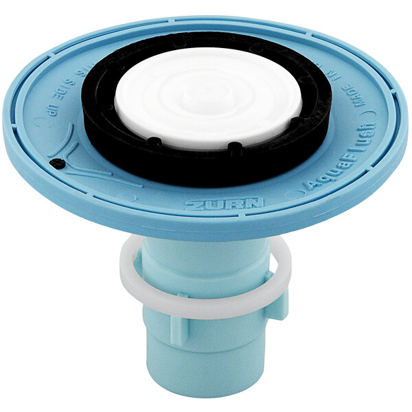 A blue and white Zurn AquaFlush water valve with a white circle and black dots.