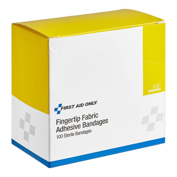 A yellow and white box of 100 First Aid Only fabric fingertip bandages.