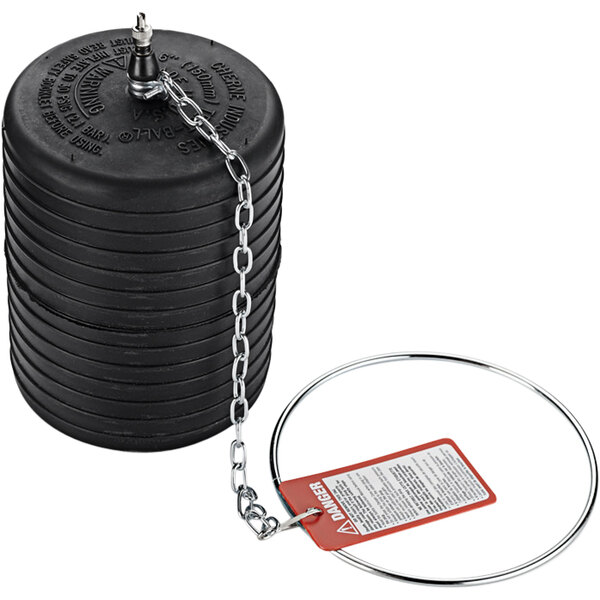 A black cylinder, the Cherne 6" Test-Ball Plug, with a chain attached.