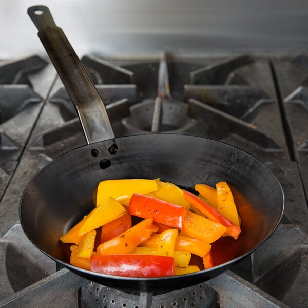 Why is the seasoning on my new wok uneven and how can I fix it? :  r/carbonsteel