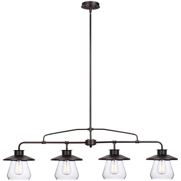 An oil-rubbed bronze pendant light with three clear glass shades hanging in a restaurant.
