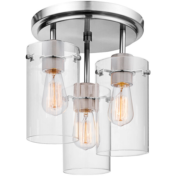 A Globe semi-flush mount ceiling light with clear glass shades.