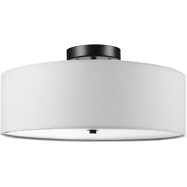A Globe Minimalist white linen flush mount light with a white shade.