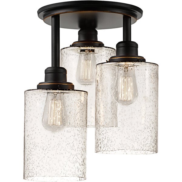 A Globe Rustic Oil-Rubbed Bronze semi-flush mount light with clear glass shades.