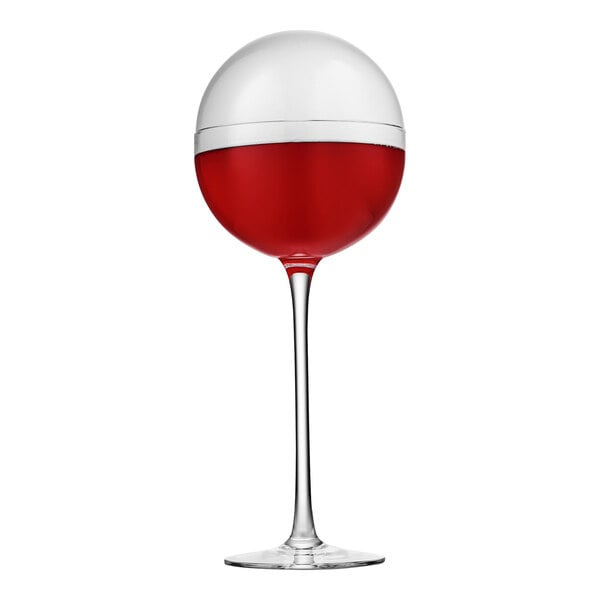 A Flavour Blaster clear wine glass with red liquid inside.