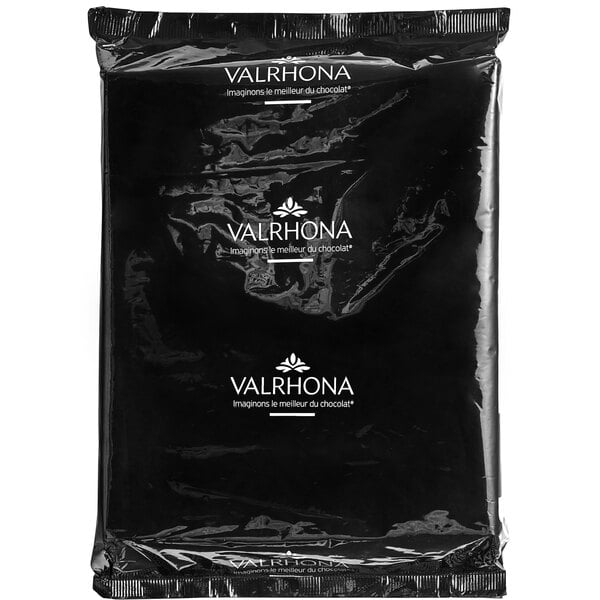 A black Valrhona package with white text.