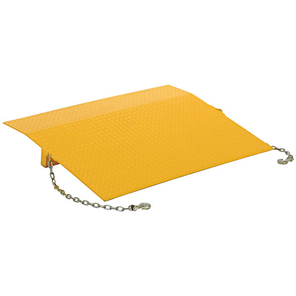 A yellow metal plate with chain attached.