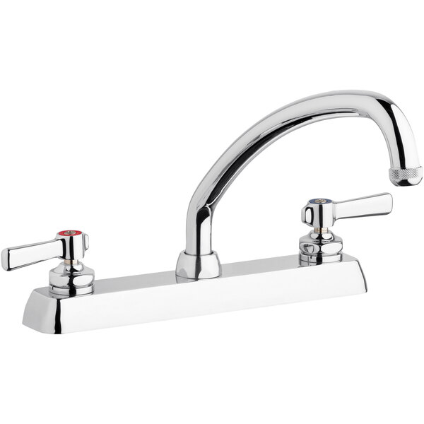 A silver Chicago Faucets deck-mounted faucet with 2 lever handles.