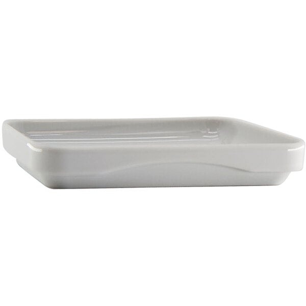 An EcoBurner white porcelain rectangular dish with a handle.