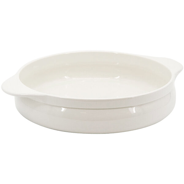 A white round porcelain bowl with handles.