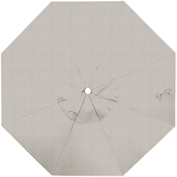 A white California Umbrella replacement canopy with a hole in the center.