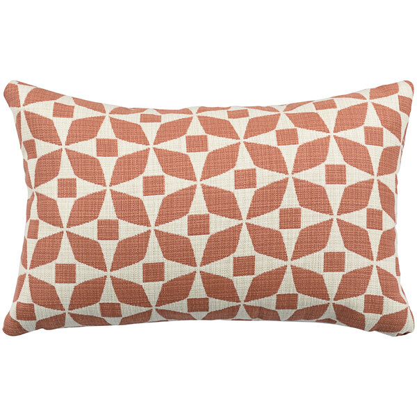 An Astella peach and white geometric throw pillow with a pattern.