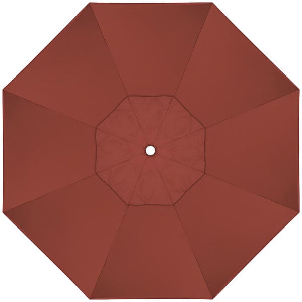 A top view of a red California Umbrella with a white center.