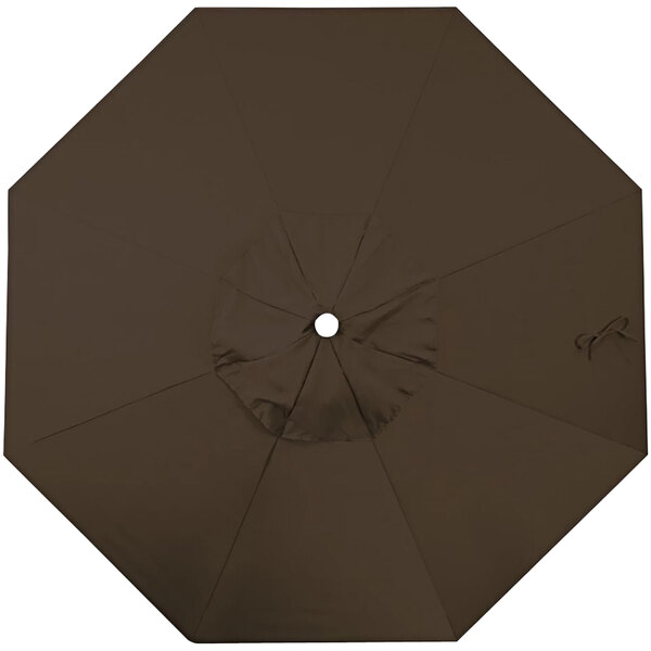 A close-up of a brown umbrella with a hole in the middle.