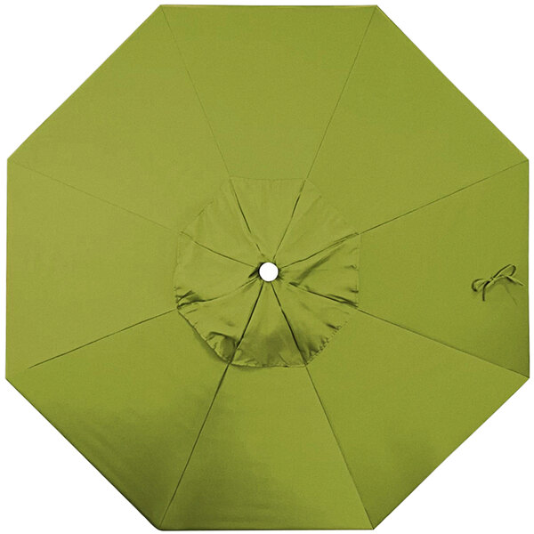 A green California Umbrella replacement canopy with a hole in the middle.
