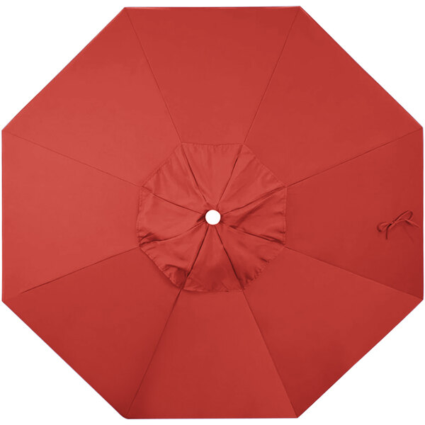 A red umbrella canopy with a white circle.