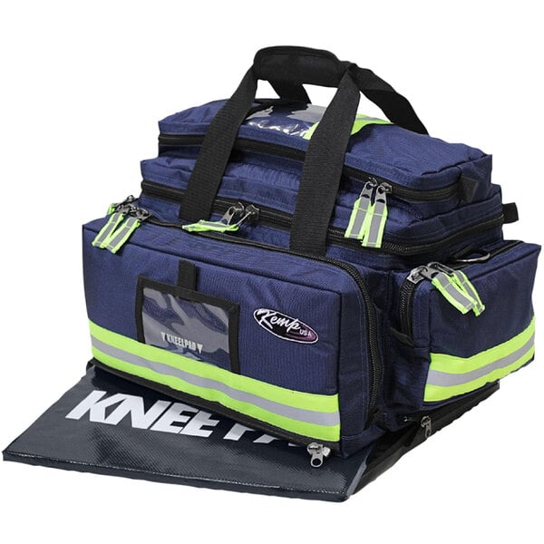 A navy blue and yellow Kemp USA professional trauma bag with a handle.