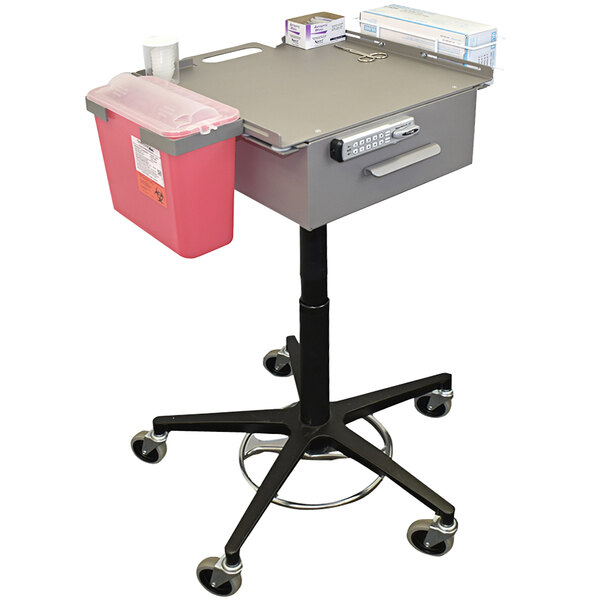 An Omnimed Phlebotomy Cart with medical equipment on it.