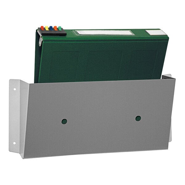 An Omnimed aluminum wall file with a green folder inside.