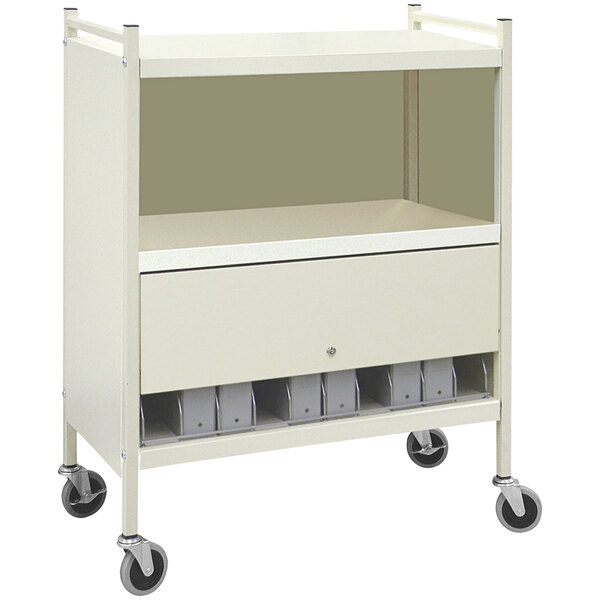 A beige medical cart with shelves and drawers.