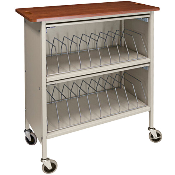 An Omnimed metal chart rack with a cherry wood top and wheels.
