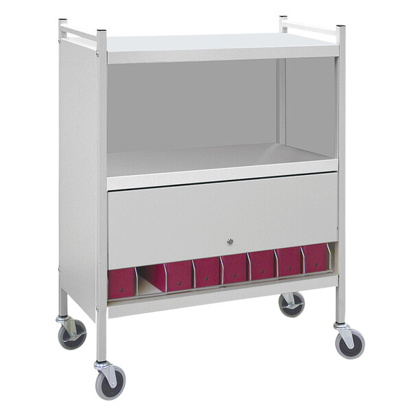 A light gray Omnimed medical cart with locking doors and shelves.