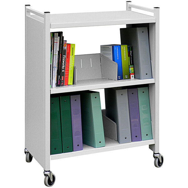A light gray Omnimed carrier cart with books and folders on it.