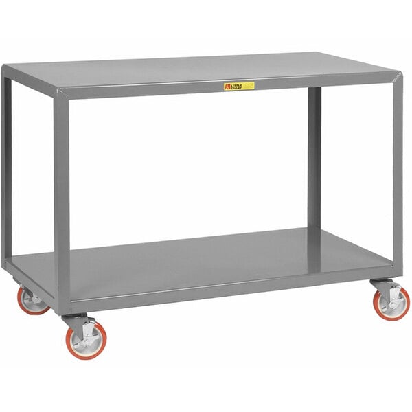 A grey steel Little Giant heavy-duty mobile 2-shelf table with orange swivel wheels.