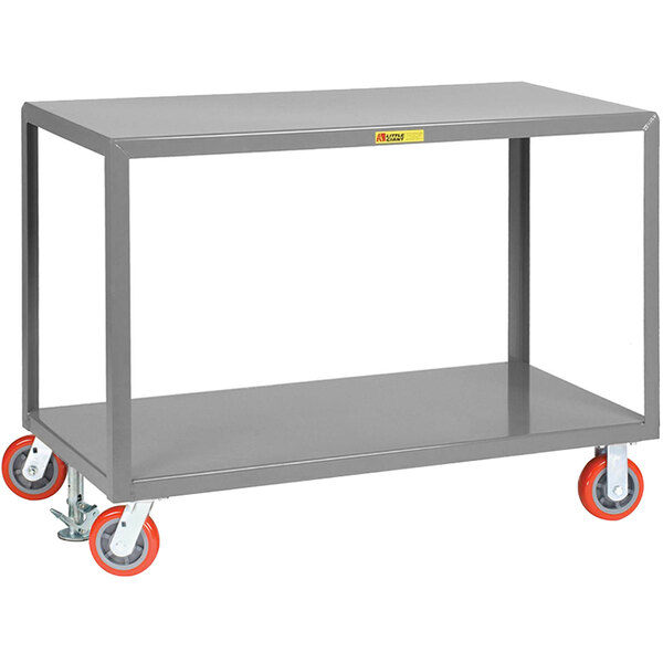A grey metal Little Giant heavy-duty mobile table cart with orange polyurethane wheels.