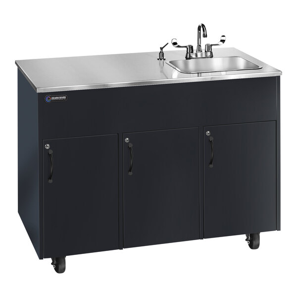 An Ozark River Manufacturing black metal portable sink with two deep basins and a faucet on a counter.