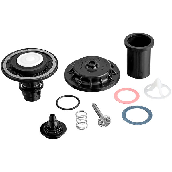 A black rubber diaphragm tune up kit for a Sloan water closet.
