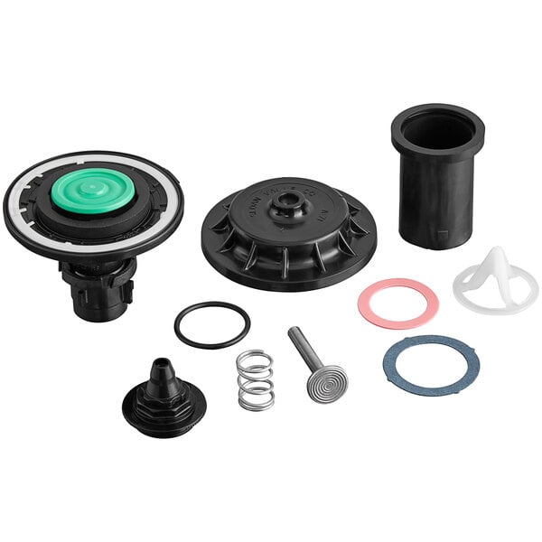 A black water valve and other machine parts for a Sloan Royal Diaphragm Tune Up Kit.