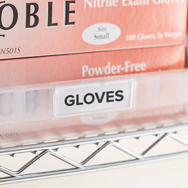 A Regency shelf with a label holder holding a label that says "gloves."