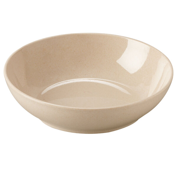A beige bamboo melamine bowl with a speckled surface.