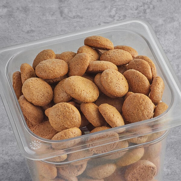 A plastic container of Homefree Gluten-Free Organic Mini Ginger Snap cookies.