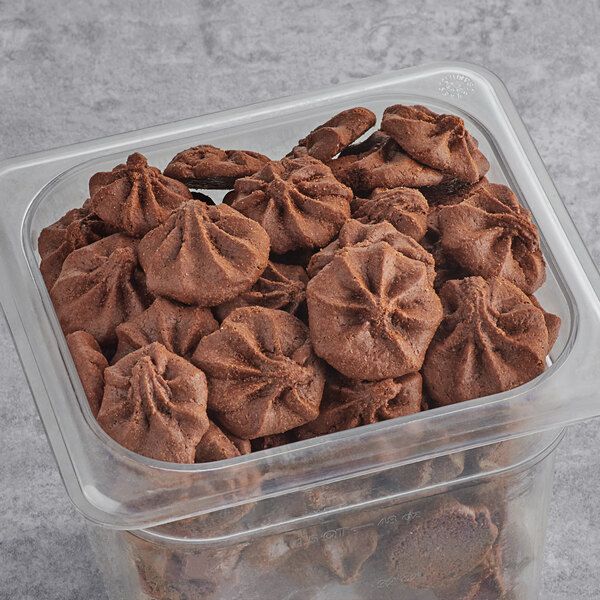 A plastic container of Homefree Gluten-Free Mini Chocolate Mint Cookies.