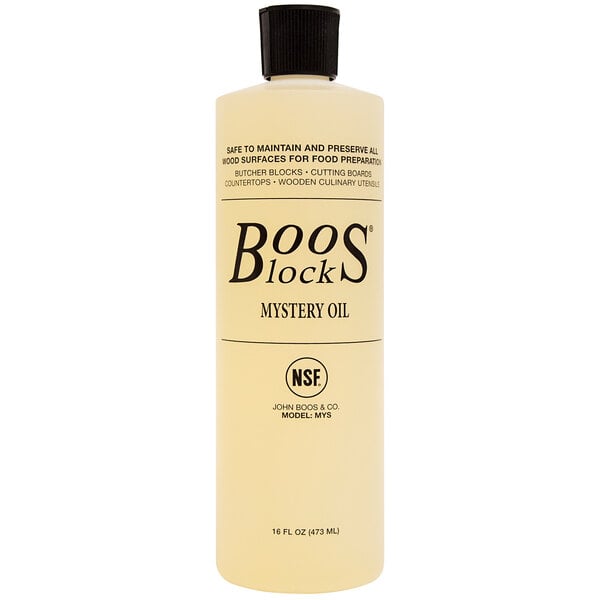 A bottle of John Boos Block Mystery Oil with a black label.