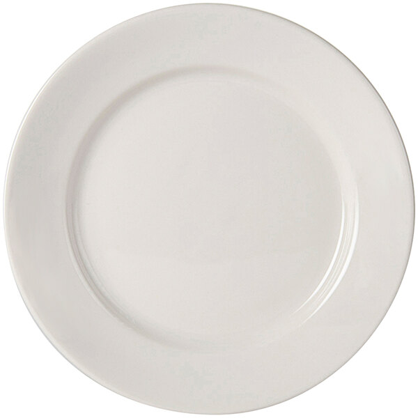 A white Tuxton Columbia china plate with a curved edge.