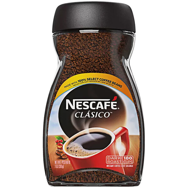 A plastic container of Nescafe Clasico Dark Roast Instant Coffee with a black lid.