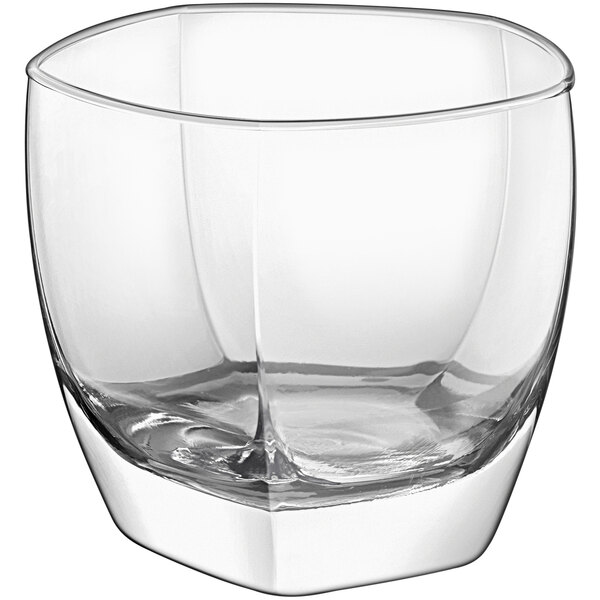 A clear Sensation Rocks glass with a curved edge.