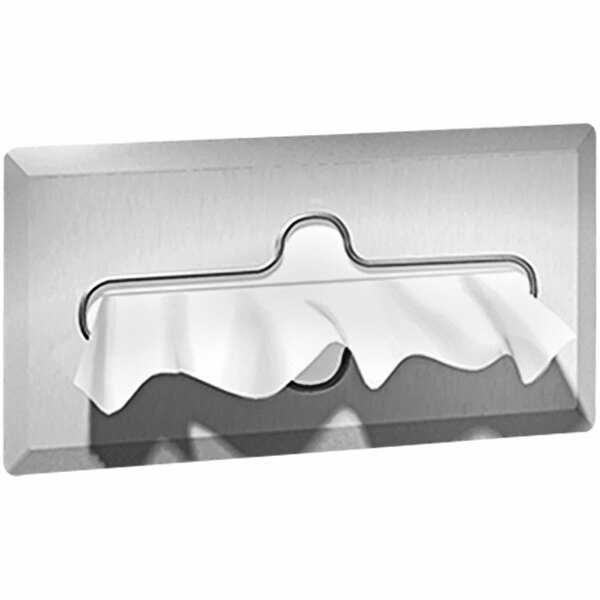 A white cloth on a satin stainless steel recessed tissue dispenser.