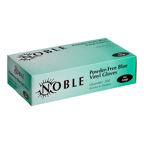 A blue box of Noble blue vinyl gloves for foodservice on a counter.