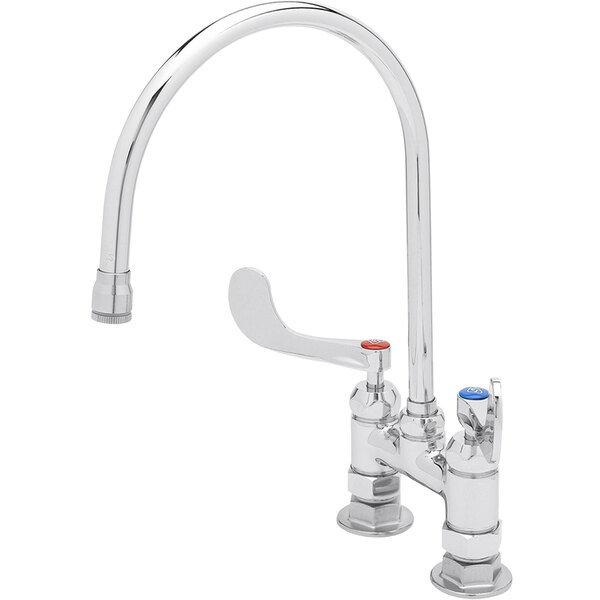 A chrome T&S deck-mount faucet with red and blue handles.