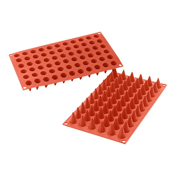 A red silicone mold with cone-shaped cavities.