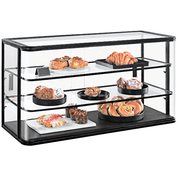 A Cal-Mil bakery display case filled with pastries.