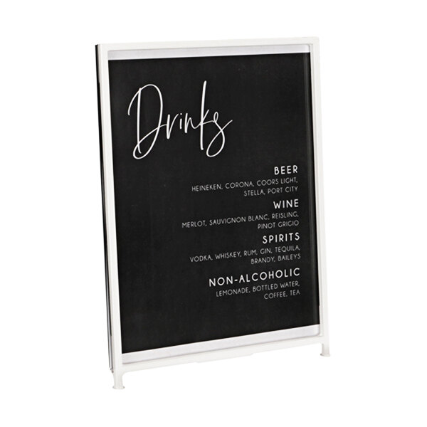 A white frame Cal-Mil displayette with a black and white menu board inside.
