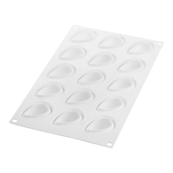 A white silicone baking mold with egg-shaped cavities.