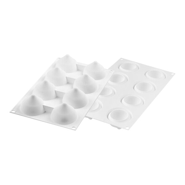 A white silicone baking mold with cone shaped cavities.
