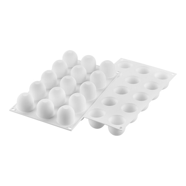 A white Silikomart silicone baking mold with 15 dome-shaped cavities.