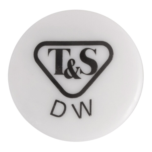 A white button with the black letters "T & S DW" on it.